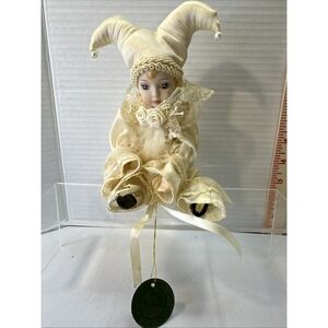 7" Sitting Jester Porcelin "Paradies" Musical Doll Cream